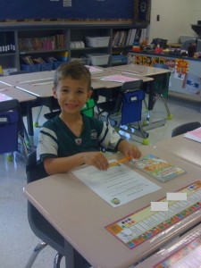 Checking out his 1st grade desk